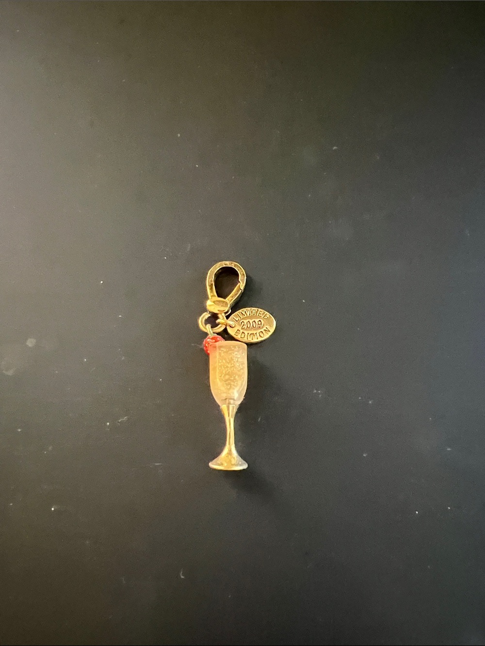 Juicy Couture Gold Champagne Flute Charm with Red Accent